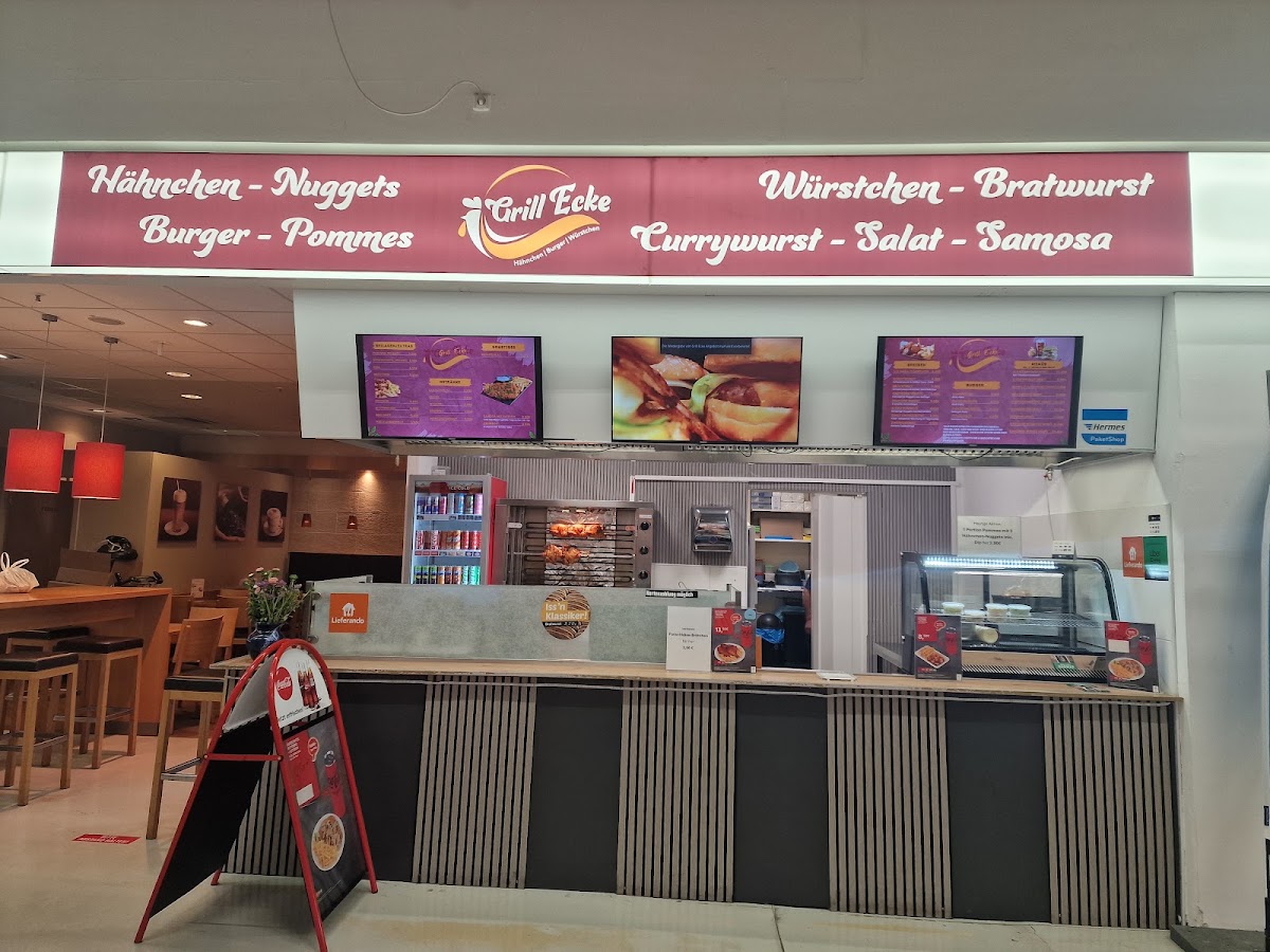 Theke der Grill Ecke in der Westoria Gießen mit Schild und Menübildschirmen