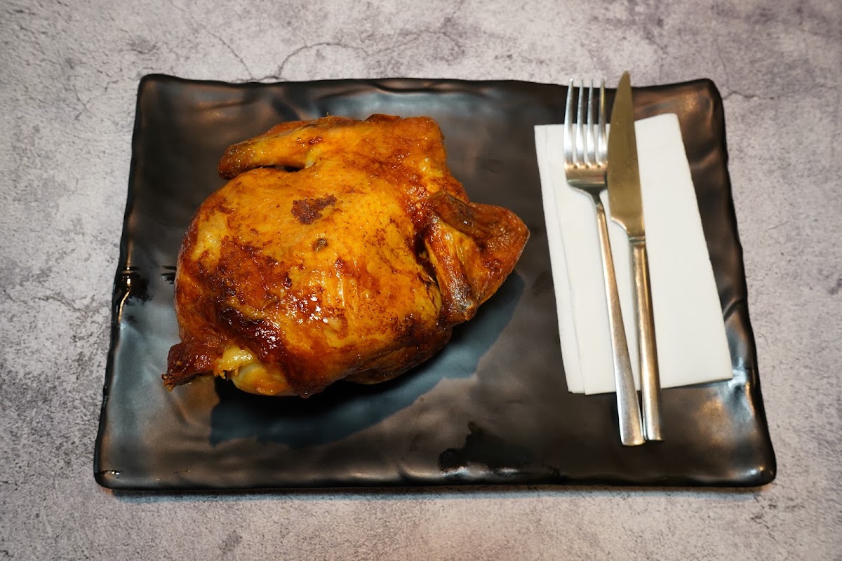 Halbes Hähnchen vom Spieß mit Pommes in der Grill Ecke Gießen